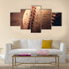 Old baseball on wooden background and highly closeup Multi panel canvas wall art