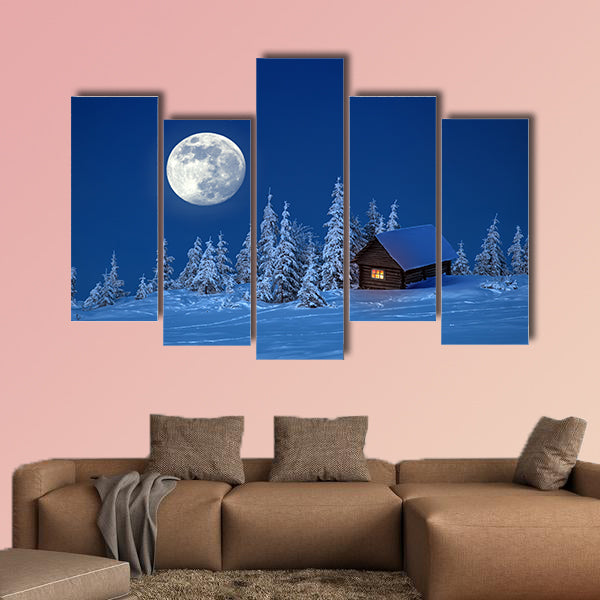 A wooden house in winter forest multi panel canvas wall art