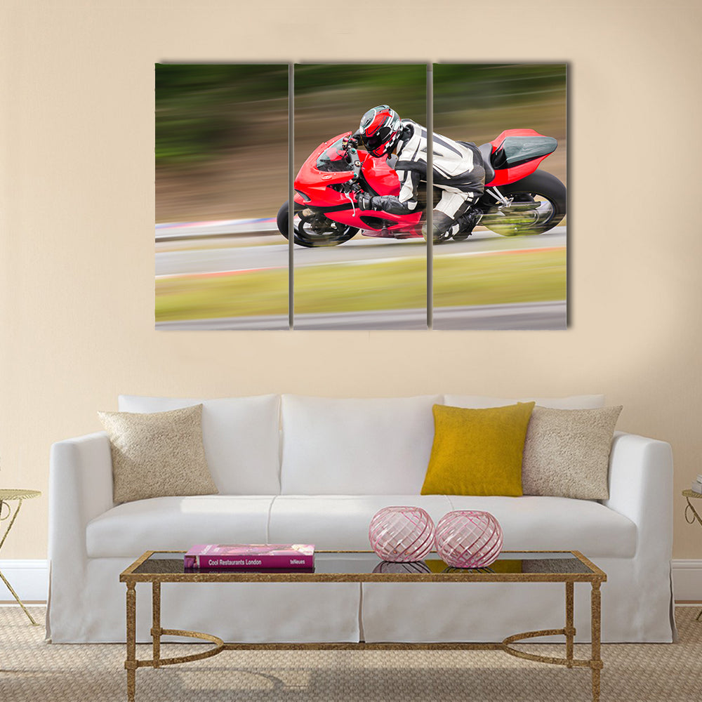Motorcycle practice leaning into a fast corner on track Multi panel canvas wall art