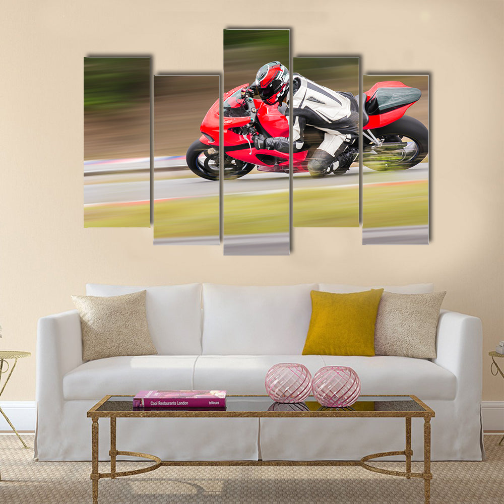 Motorcycle practice leaning into a fast corner on track Multi panel canvas wall art
