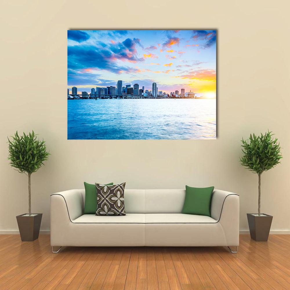 Miami city skyline panorama at dusk with urban skyscrapers over sea with reflection multi panel canvas wall art