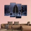 Faceless angel of death in loose overall among graves in the cemetery multi panel canvas wall art