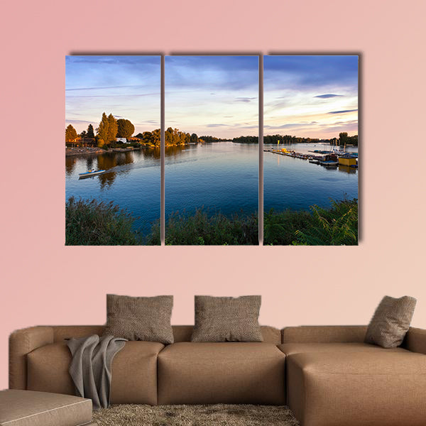 Sunset at the Old Danube in Vienna with some boats Multi panel canvas wall art