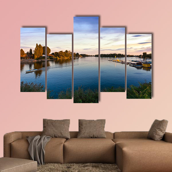 Sunset at the Old Danube in Vienna with some boats Multi panel canvas wall art