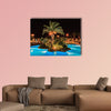 Tropical swimming pool in night view multi panel canvas wall art