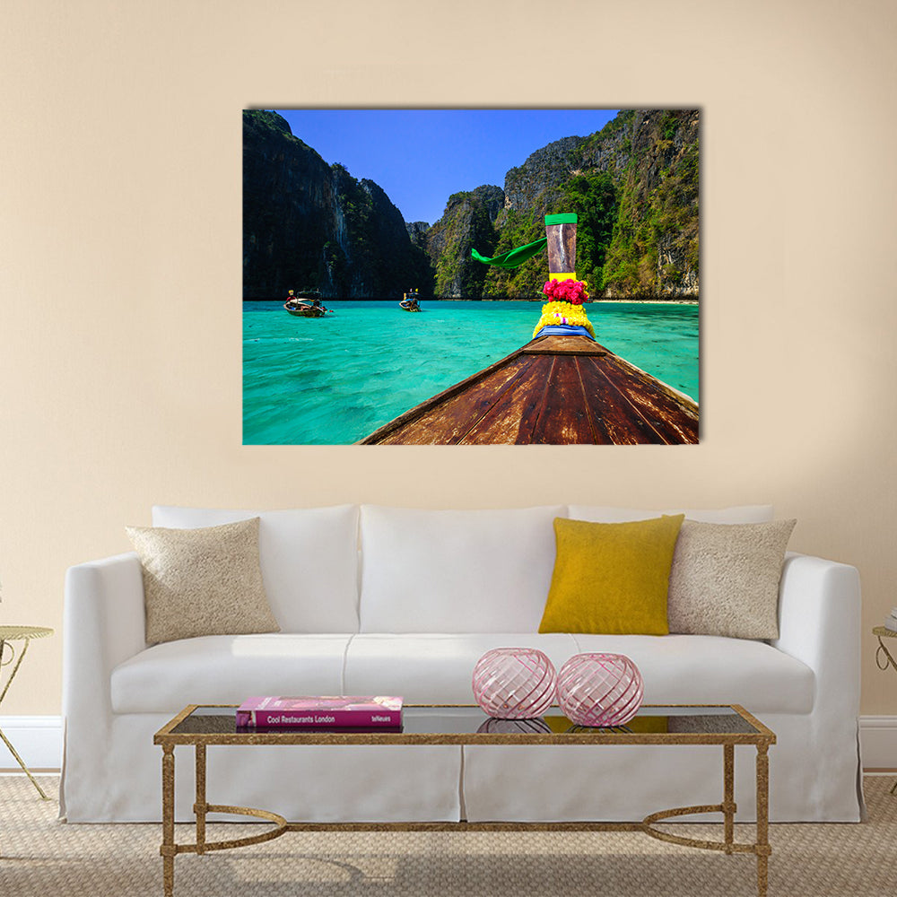 Traditional long tail boat in Pile Bay Multi Panel Canvas Wall Art
