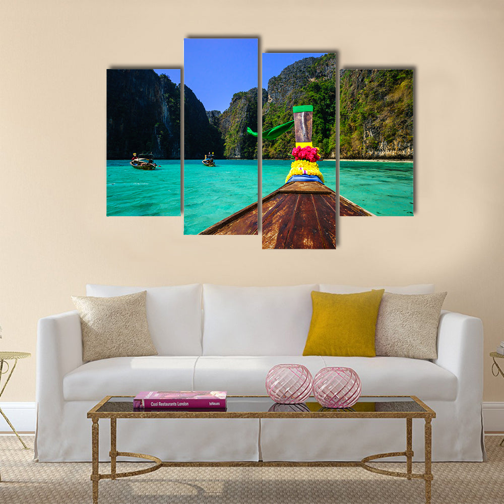 Traditional long tail boat in Pile Bay Multi Panel Canvas Wall Art