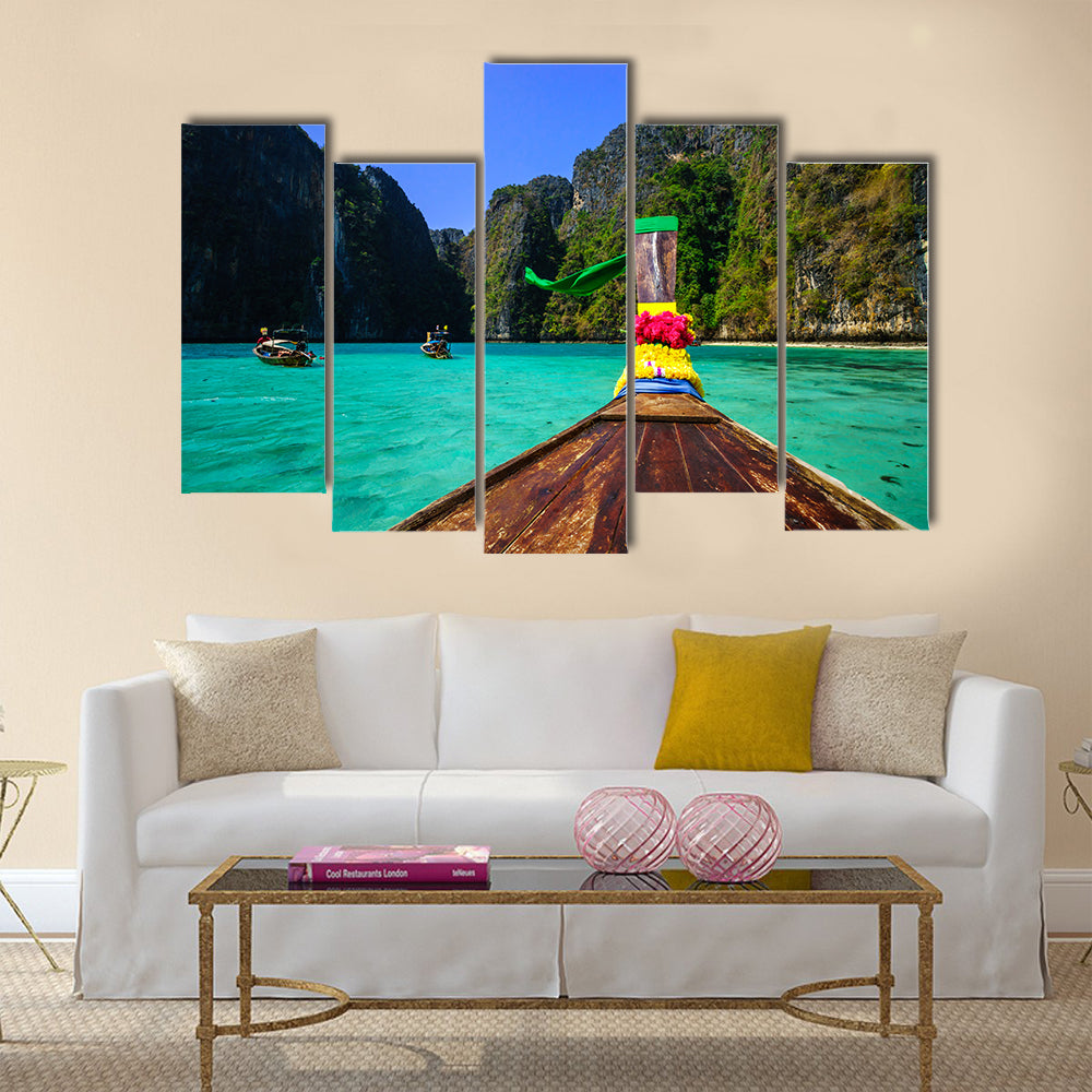 Traditional long tail boat in Pile Bay Multi Panel Canvas Wall Art