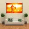 Basketball player silhouette dribbling with lights Multi panel canvas wall art