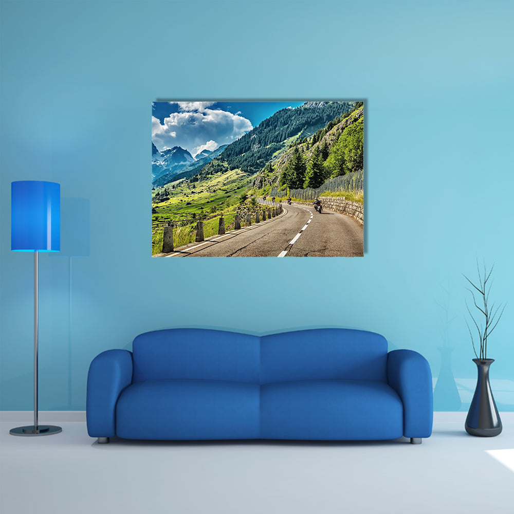 A Group of bikers touring on mountainous road Multi Panel Canvas Wall Art