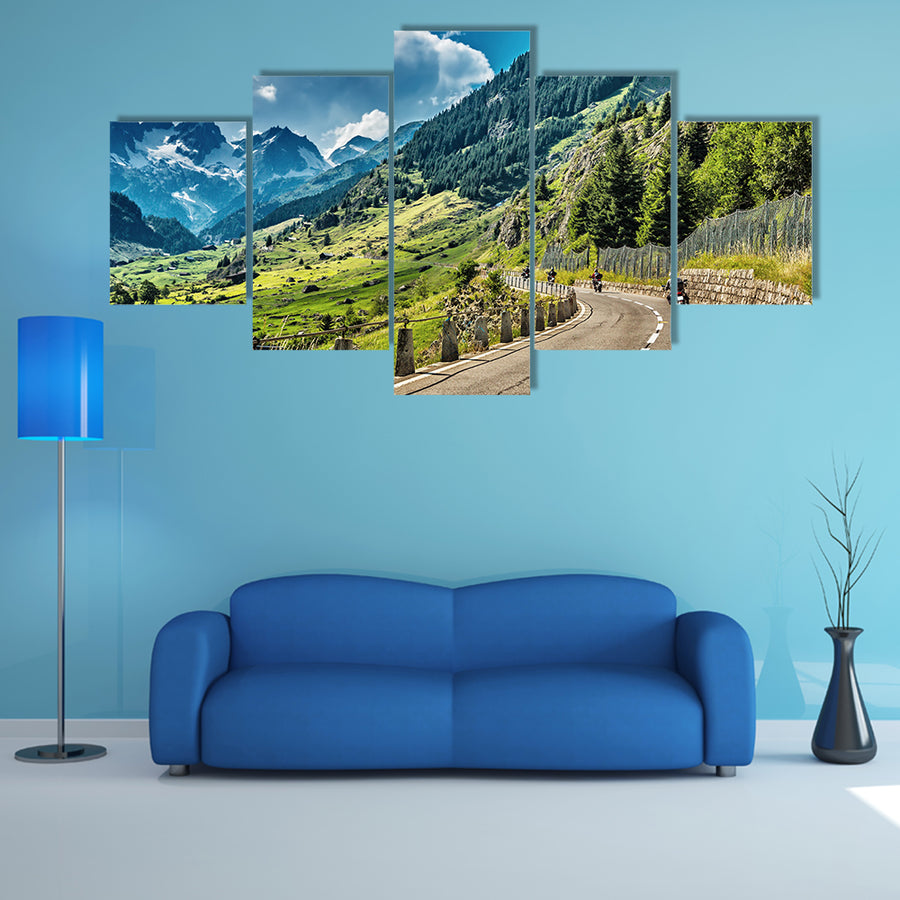 A Group of bikers touring on mountainous road Multi Panel Canvas Wall Art