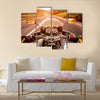 Biker driving a motorcycle rides along the asphalt road. First-person view Multi panel canvas wall art