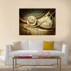 Old tennis ball and racket with sneakers on a wooden floor Multi panel canvas wall art