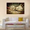 Old tennis ball and racket with sneakers on a wooden floor Multi panel canvas wall art