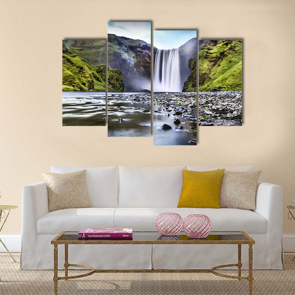famous Skogafoss waterfall in Iceland at dusk multi panel canvas wall art