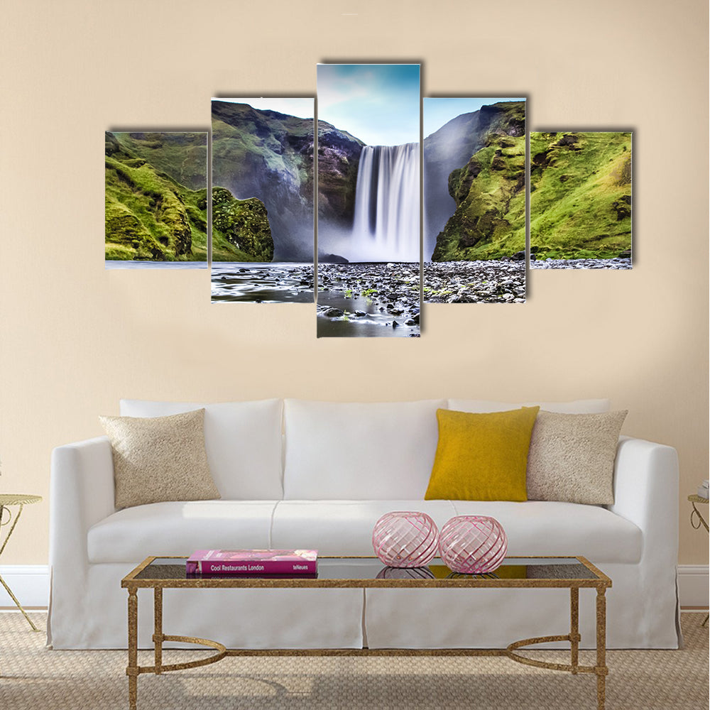 famous Skogafoss waterfall in Iceland at dusk multi panel canvas wall art