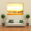 Local Fishermen Pull Net From The Ocean In Hikkaduwa, Sri Lanka Multi Panel Canvas Wall Art