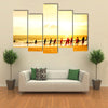 Local Fishermen Pull Net From The Ocean In Hikkaduwa, Sri Lanka Multi Panel Canvas Wall Art