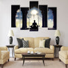 Meditating in old temple sunset sky with light hole in the clouds board Multi panel canvas wall art