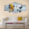 Ice hockey players on the ice Multi panel canvas wall art