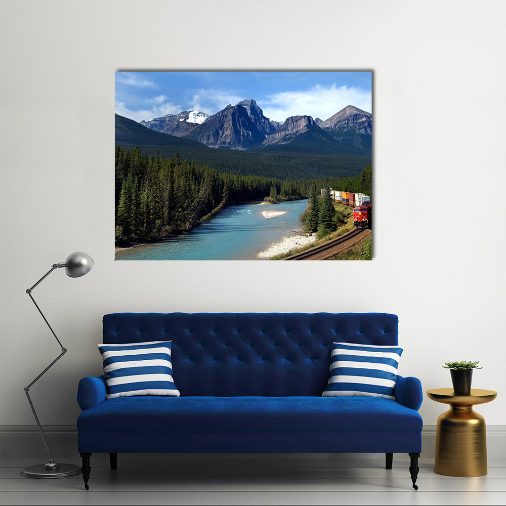 Freight train moving along Bow river in Canadian Rockies Multi panel canvas wall art