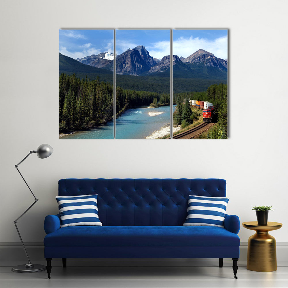 Freight train moving along Bow river in Canadian Rockies Multi panel canvas wall art