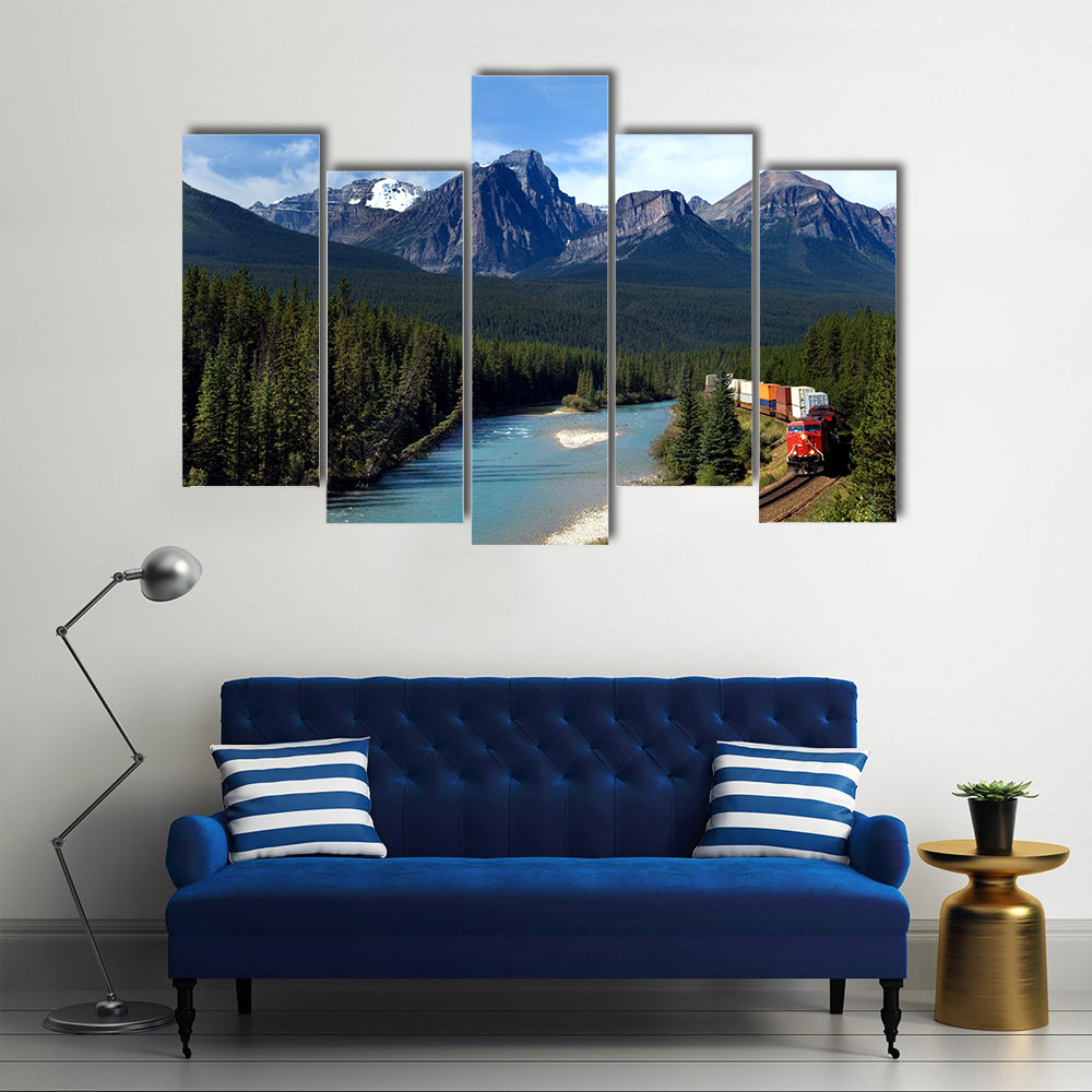 Freight train moving along Bow river in Canadian Rockies Multi panel canvas wall art