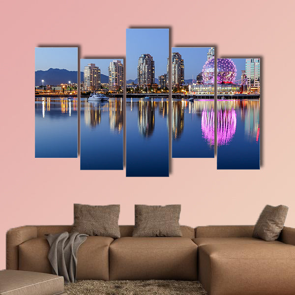 A beautiful clear summer night in Vancouver, BC features a pink glowing wall art