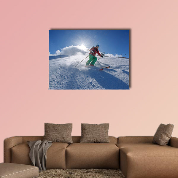 Skier skiing downhill in high mountains against sunset Multi panel canvas wall art