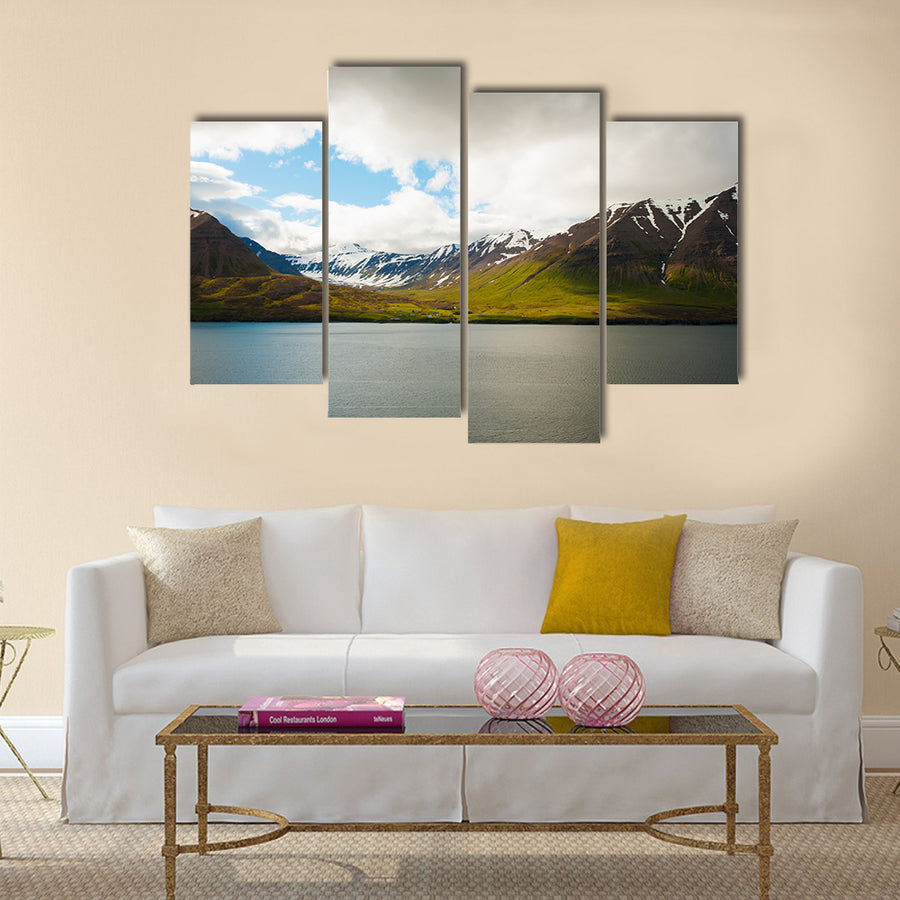 mountains covered by snow near Olafsfjordur multi panel canvas wall art