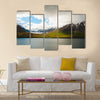 mountains covered by snow near Olafsfjordur multi panel canvas wall art