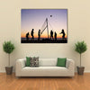 people playing beach volleyball on the beach in Brittany Multi panel canvas wall art