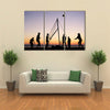 people playing beach volleyball on the beach in Brittany Multi panel canvas wall art