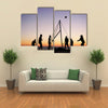 people playing beach volleyball on the beach in Brittany Multi panel canvas wall art