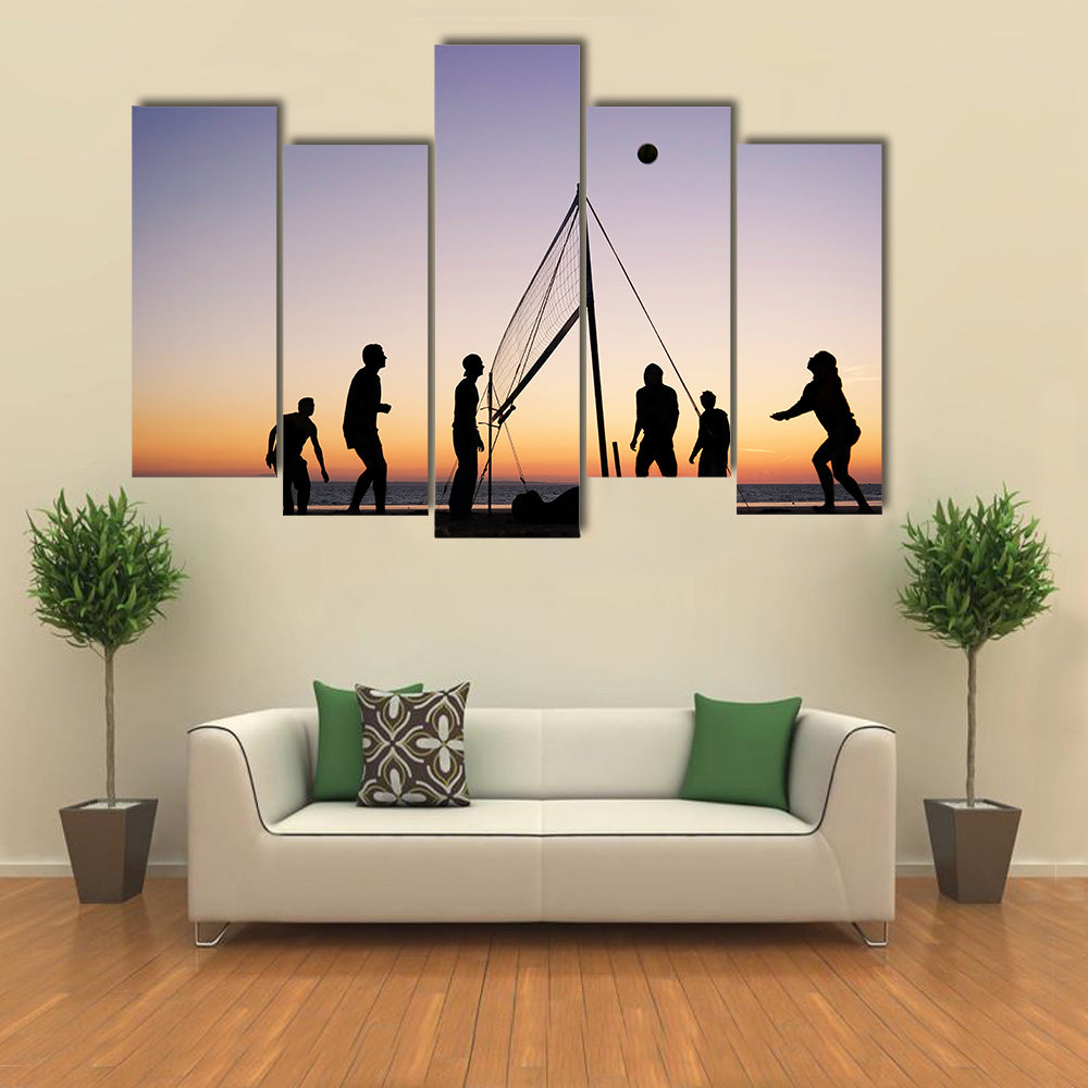 people playing beach volleyball on the beach in Brittany Multi panel canvas wall art