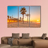 Barceloneta Beach in Barcelona with colorful sky at sunrise Multi panel canvas wall art