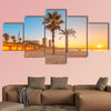 Barceloneta Beach in Barcelona with colorful sky at sunrise Multi panel canvas wall art