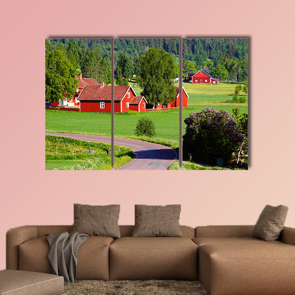 Old red farm houses in a rural landscape, Sweden multi panel canvas wall art
