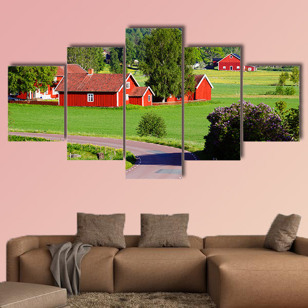 Old red farm houses in a rural landscape, Sweden multi panel canvas wall art