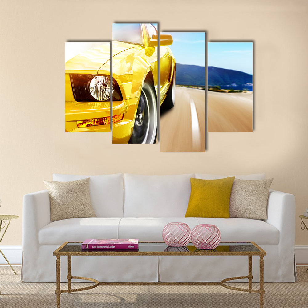 Yellow sport car on a narrow road Multi panel canvas wall art