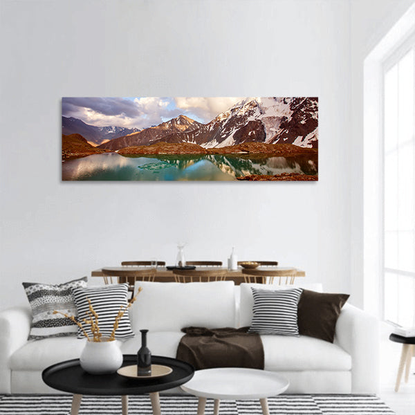 Mountain lake with reflection of nearest mountains panoramic canvas wall art