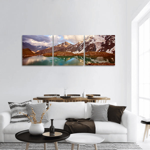 Mountain lake with reflection of nearest mountains panoramic canvas wall art