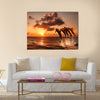 beautiful sunset with dolphins jumping multi panel canvas wall art