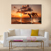 beautiful sunset with dolphins jumping multi panel canvas wall art