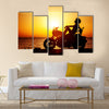 Motorcycle traveling the world girl resting on the beach road Multi panel canvas wall art