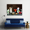 Christmas drinks, alcoholic beverages and cocktails in glasses Multi panel canvas wall art