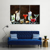 Christmas drinks, alcoholic beverages and cocktails in glasses Multi panel canvas wall art