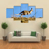 Kangaroo jumping over horizon Multi Panel Canvas Wall Art