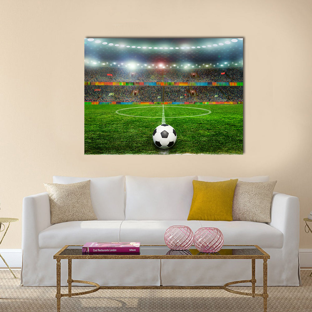 Soccer ball on the field of stadium with light Multi panel canvas wall art