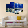 Multiple eletric lightning strikes over river Multi Panel Canvas Wall Art